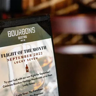 flight of the month sign
