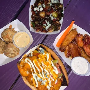 Buffalo Cauliflower Po'Boy  Fried Brussels Sprouts Sweet Mango BBQ Wings  Pepper Jack Stuffed Boudin Balls