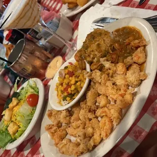 Two 2 Step Combo (Fried Crawfish, Crawfish Etouffee, and Side Salad with Sauted Vegetables).