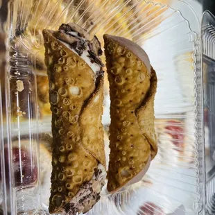 two cookies in a plastic container