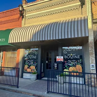 a man standing in front of a business