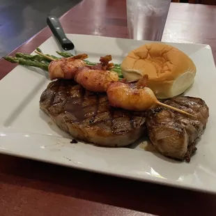 Steak and shrimp.