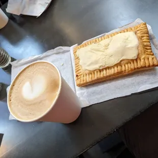 a pastry and a cup of coffee