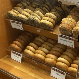 a variety of bagels on display