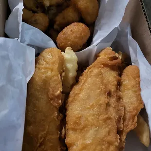 Fish n chips with fried mushrooms.... this place is so good, employees super nice and everything's better in their nacho cheese sauce!