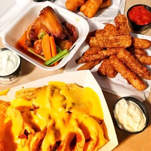 Nachos, fried Zucchini, 5 pc Hot Wings, and fried Mozzarella