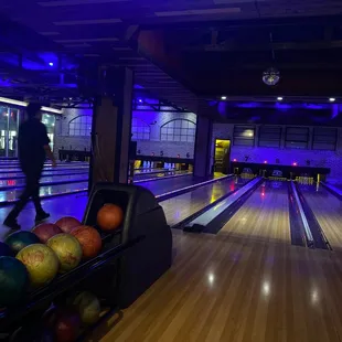 a bowling alley with bowling balls