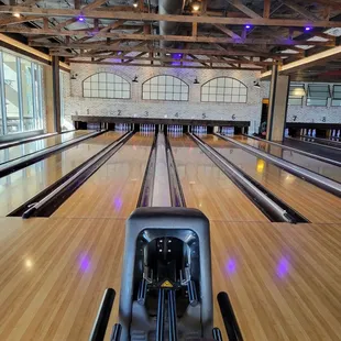 a bowling alley with bowling balls