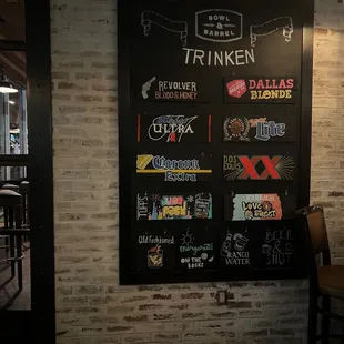 a chalkboard with various drinks on it