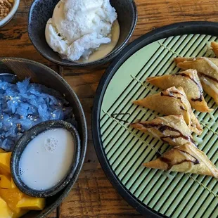 Sticky rice with mango and fries banana with vanilla ice cream