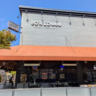 Outside. Storefront and outdoor patio. This Bowl'd BBQ location is at South Shore Center in Alameda.