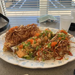 (Left to right): Story roll, baked salmon roll, and king roll