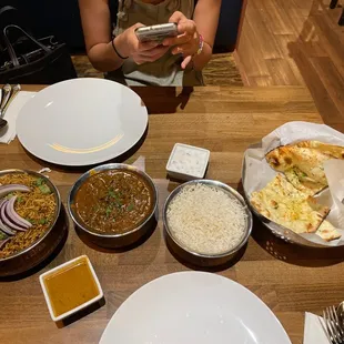 Chicken Biryani, Methi Curry, and Garlic Naan