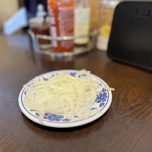 a plate of noodles on a table