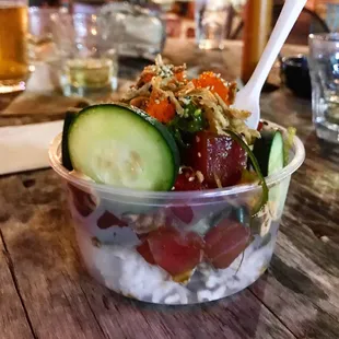 a salad in a plastic container