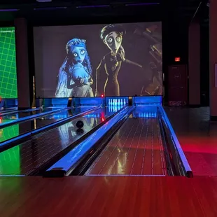 My favorite big giant TV and a bowling lane and dim lighting