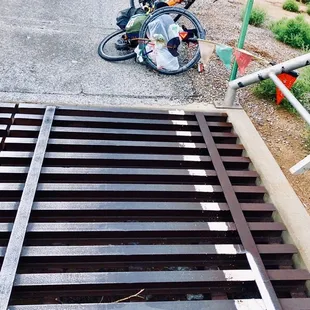 Sadly, the overnight rain which forced me inside the picnic area also left metal cattle guards damp--and SLICK!