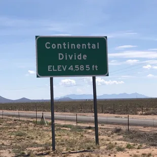 This sign is located on Interstate 10 in New Mexico between Lordsburg (West of the divide) and Deming (East of the divide)