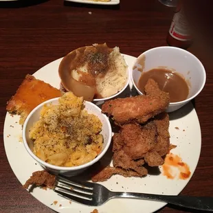 Sorry, I had to dig in. This is the fried chicken, mashed potatoes and gravy, corn bread,and macaroni and cheese. Everything was delicious!