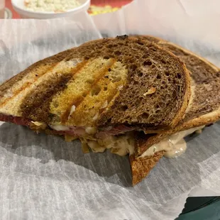 This picture of the Reuben does not do it  sandwich justice
