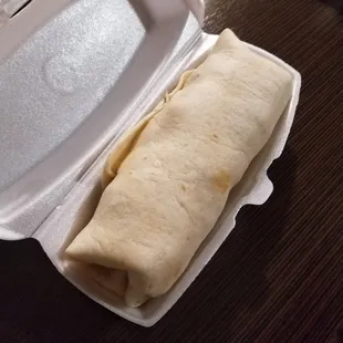 Phuphu dog. Hot dog with ghost pepper cheese, white cheddar mac and cheese, sriracha, wrapped in a tortilla.   Grab some water!