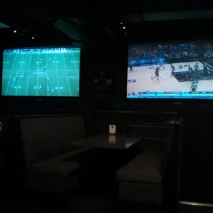 Huge screens with comfy private boxes.  Can't wait to watch the Packers here.  Too bad it will be next year.