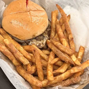 a basket of french fries and a hamburger