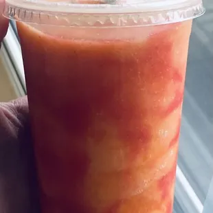 mango smoothie with strawberry purée