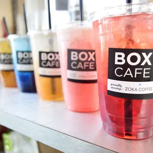 a variety of drinks on a shelf