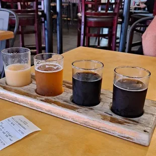 Tasty flight: Hazy IPA, Optional Disorientation IPA, under the Big Black Sun, M Mountain Obscured Stout, Time of the Preacher Red Ale.