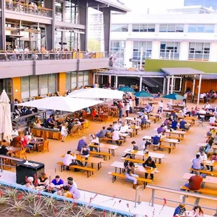 people sitting at tables and eating