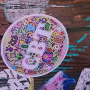 a plate with stickers on it