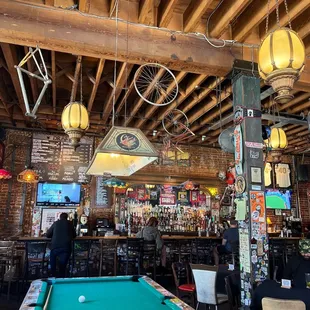 a pool table in a bar