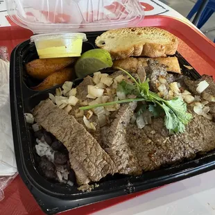 Black bean Cuban bowl with steak. The side of the cilantro sauce has a nice little kick.