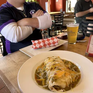 Breakfast Burrito smothered or handheld.