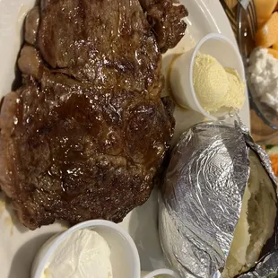 Small ribeye and baked potato cane out fresh and hot