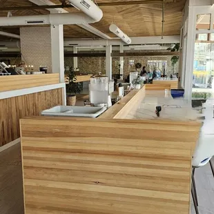 a kitchen with wooden counter tops