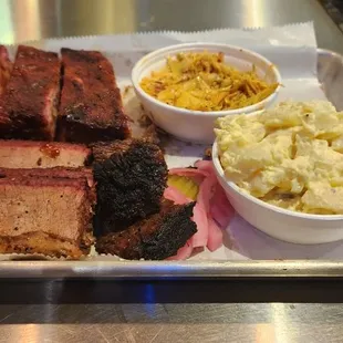 2 meat combo with brisket, ribs, potato salad, and slaw