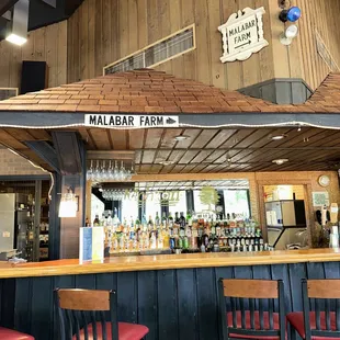 a bar with a wooden roof