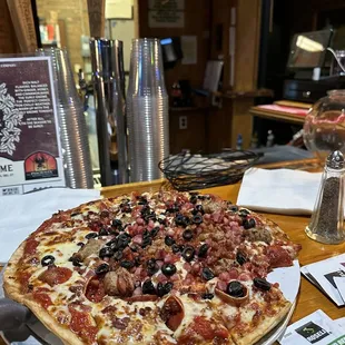 Meat pizza with black olives!