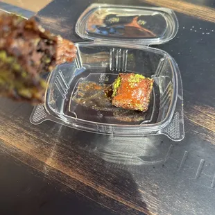 a piece of food in a plastic container