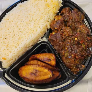 Rice with designer stew (mixed meats)
