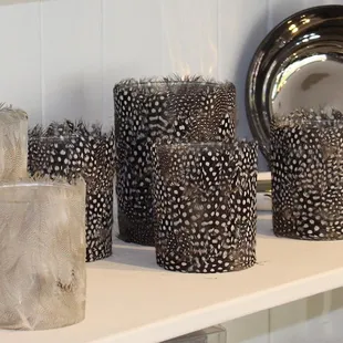We just got these beautiful feathered candleholders back in stock! They&apos;re a perfect way to add some coziness to your home for fall!
