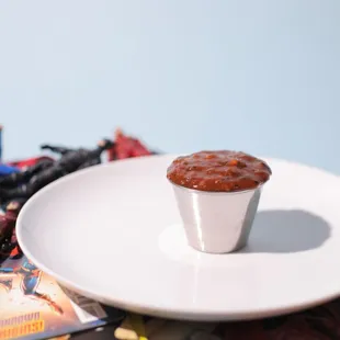 a white plate with a cupcake on it