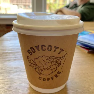 a cup of coffee on a table