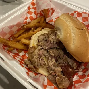 Hog sandwich with fries