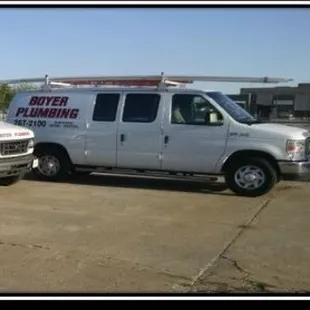 two trucks parked in a parking lot