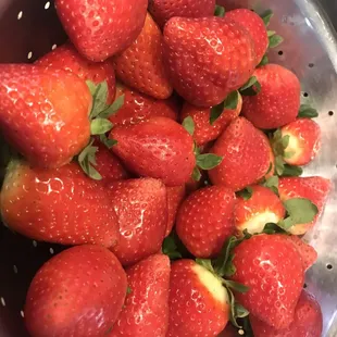 strawberries in a colander