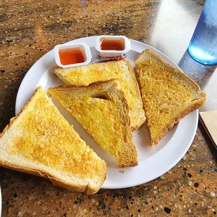 a plate of grilled cheese sandwiches