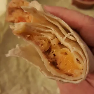 This is a BRC burrito that I bought from them tonight.  Seriously!?! It&apos;s like a rolled quesadilla! SO DISAPPOINTING!!
